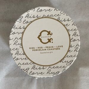 NIB C. Wonder Gold and Black Porcelain Coasters